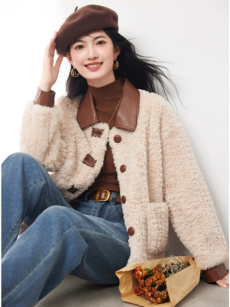 Женская шуба из искусственной кожи контрастного цвета в стиле пэчворк с