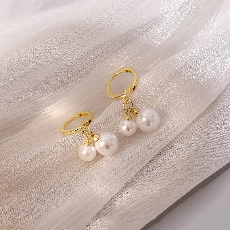 

Ins style simple geometric pearl earrings Korea retro earrings net red literary fan temperament earrings female