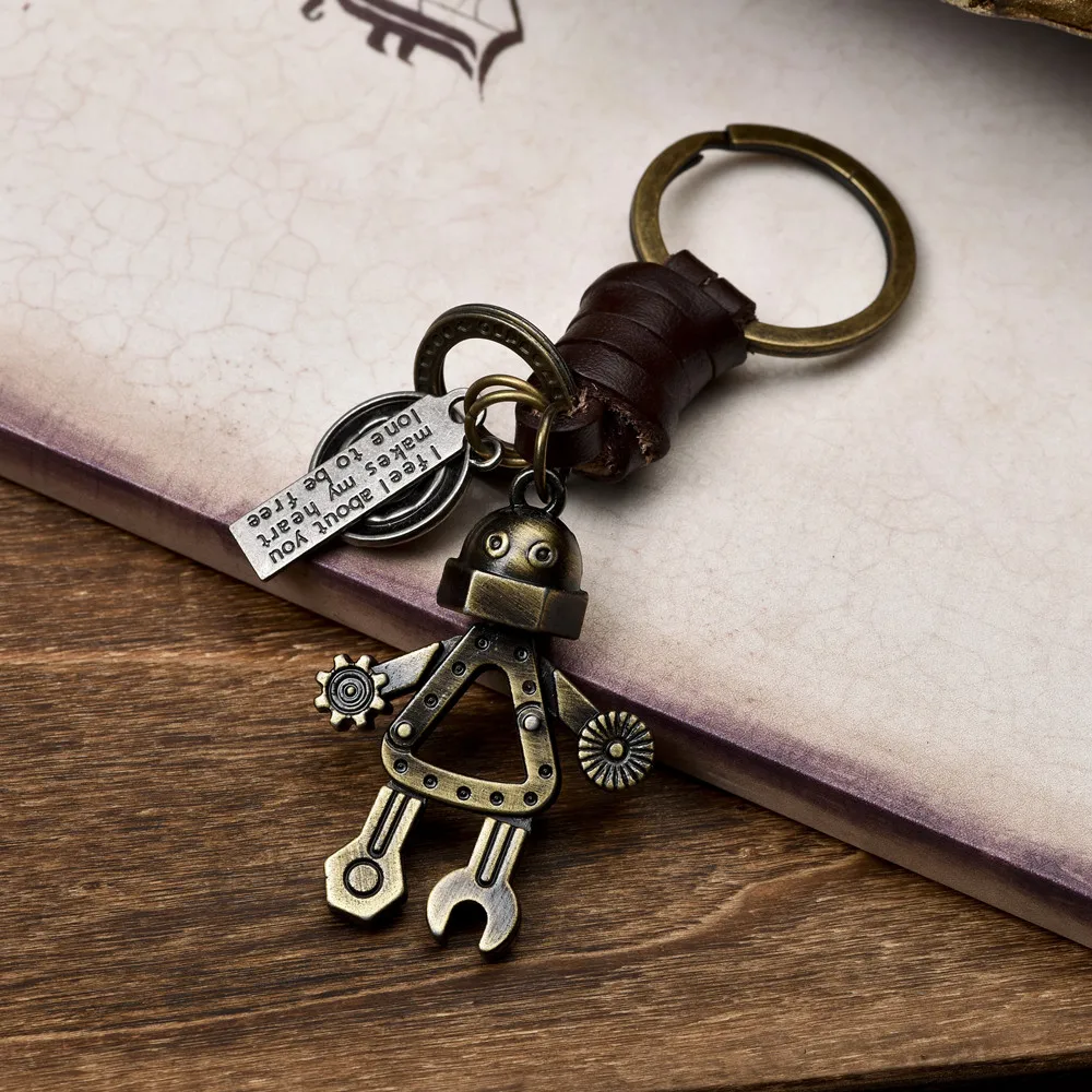 Vintage woven cowhide keychain, simple and personalized, cute robot pendant, car key pendant