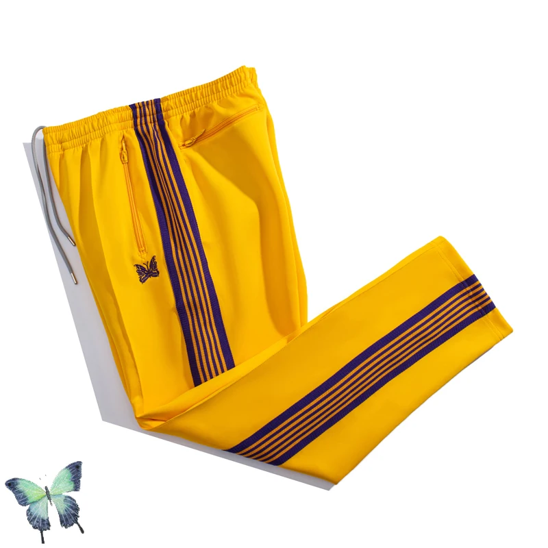 

Needles Sweatpant Butterfly Embroidered AWGE Yellow Color Side Webbing Trouser Pants