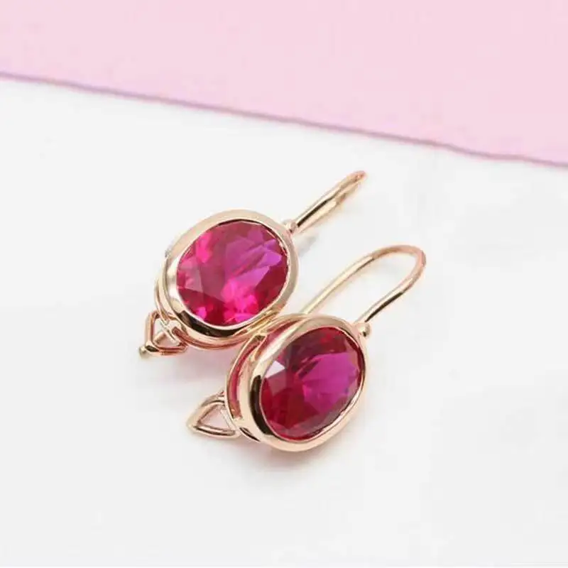 

Europe and America's New Red Gem Oval Hollow Earrings Fashion Simple Rose Gold High-end Luxury Quality Earrings
