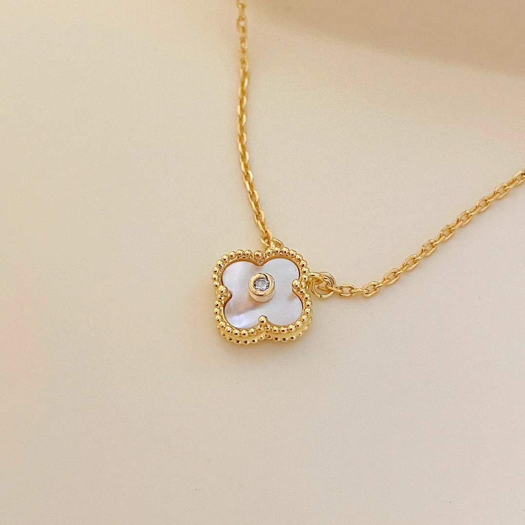 

Новинка 2022, ожерелье из четырехлистного клевера, женская маленькая белая перламутровая ожерелье из стерлингового серебра пробы, синяя зеле...