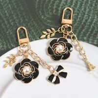 camellia black bow keychain pearl fashion jewelry pendant luxury flower car bag key ring anti lost gift accessories wholesale