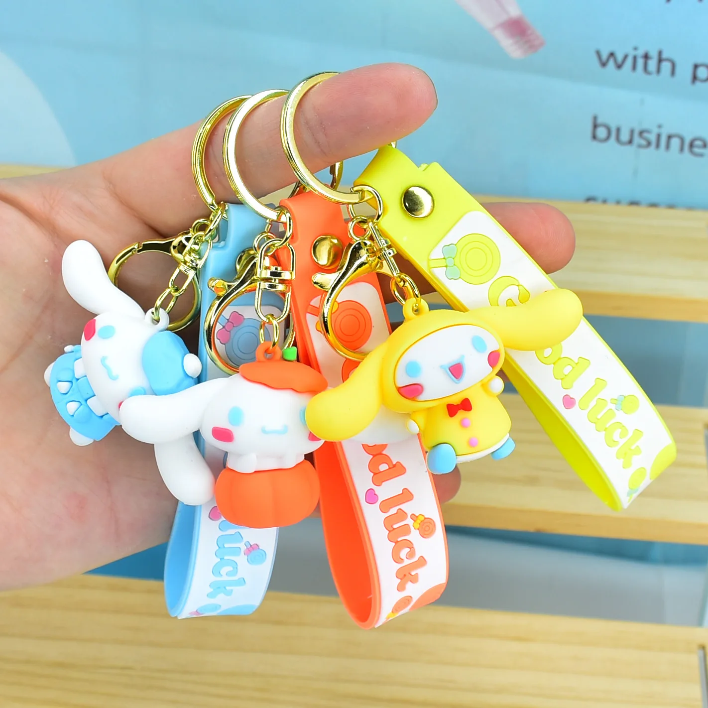 

Sanrio Cinnamoroll Keychain Kawaii Cartoon Doll Bag Pendant Soft Rubber Rope Car Key Chain Small Gift Bag Charm Accessories