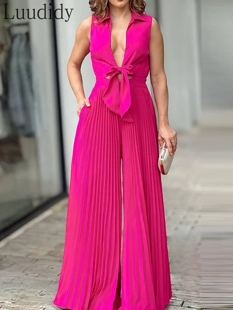 

Женский плиссированный комбинезон с широкими штанинами и отложным воротником