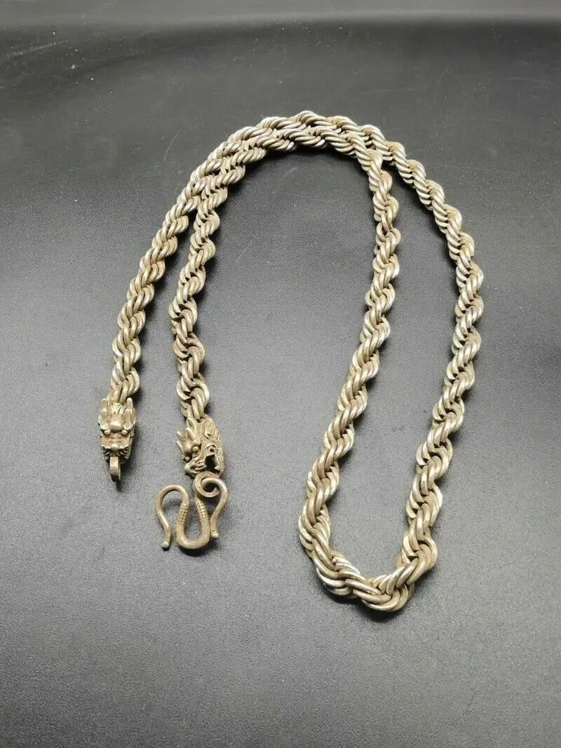 

Old Chinese tibet silver handcarved double dragon head necklace