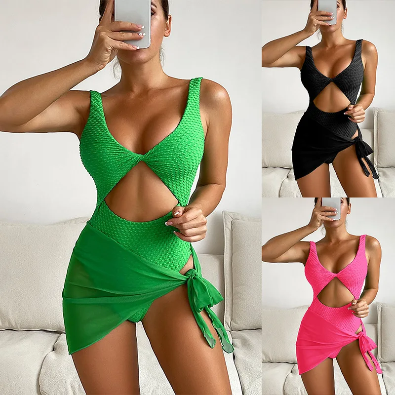 

2023New Sexy Hollow Out Cut Out Twist Front One Piece Swimsuit Knot Side Beach Skirt Solid Color Swimwear Bathing Suit For Women