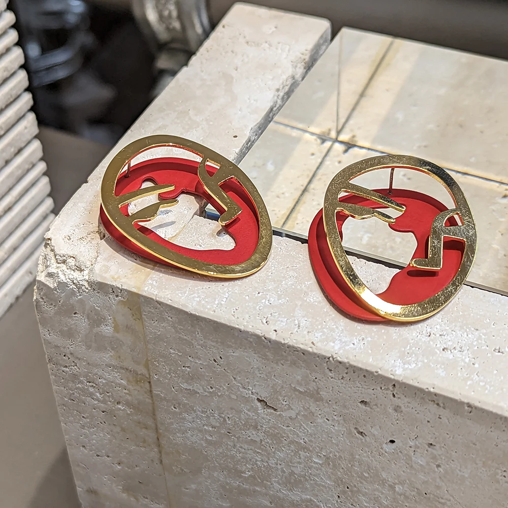 

Three color abstract face art earrings