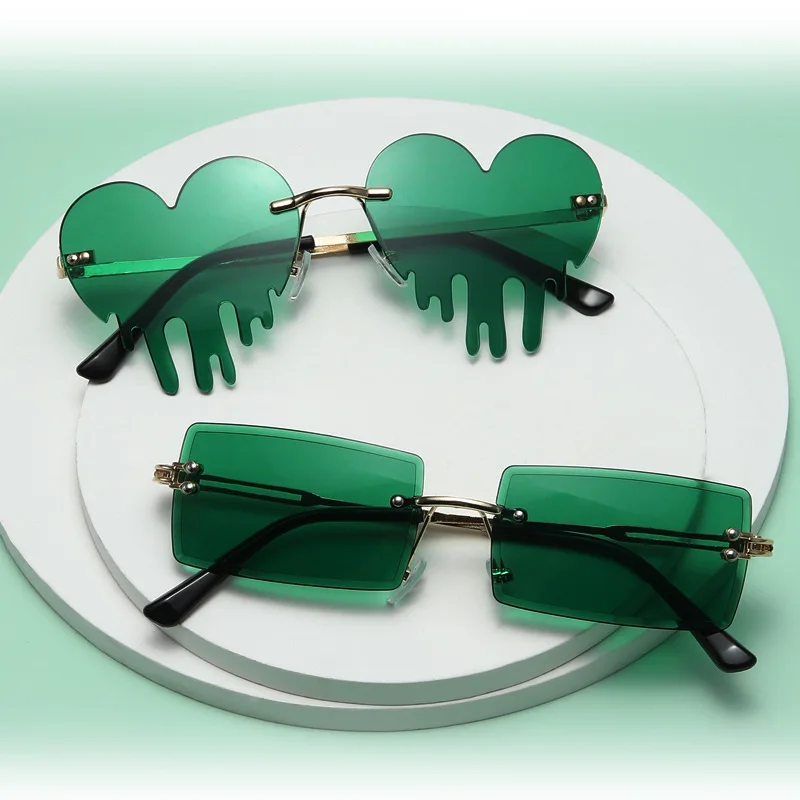 

Green Four Leaf St. Patrick's Day Irish Shamrock Sunglasses Clover Leprechaun Costume Sun Glasses Rimless Eyewear for Women