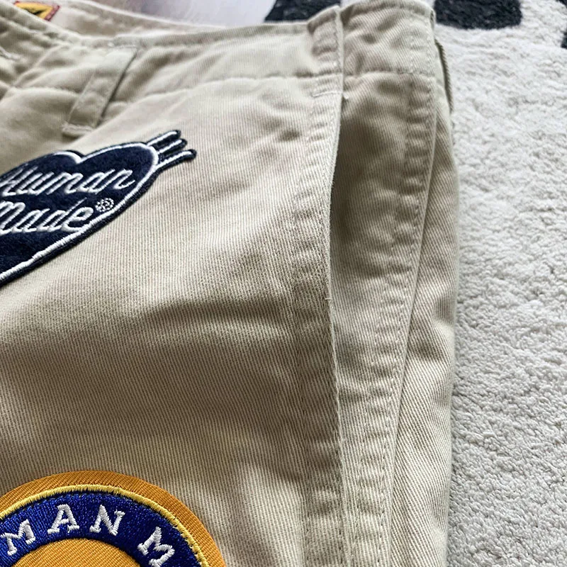 

Вышитые мужские и женские брюки до колен