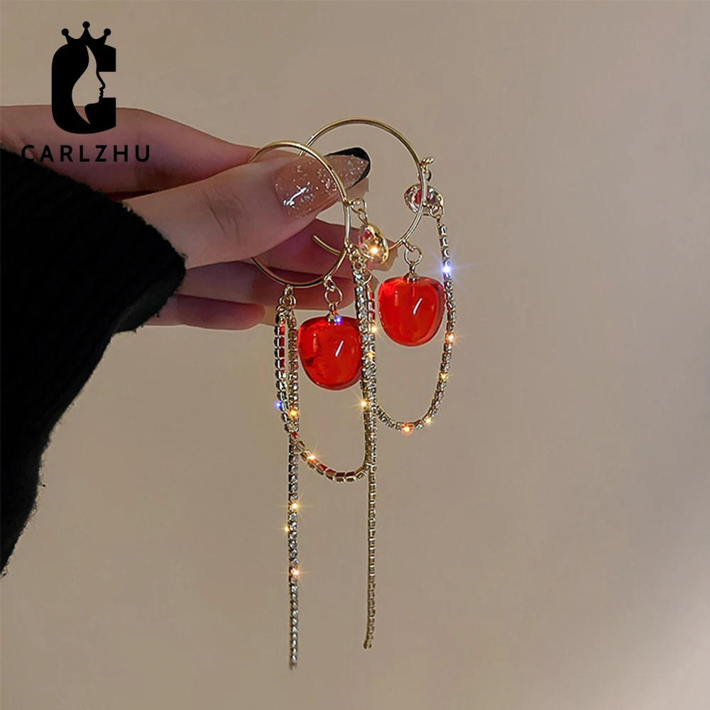 

Серьги-подвески женские из серебра 925 пробы с красными кристаллами