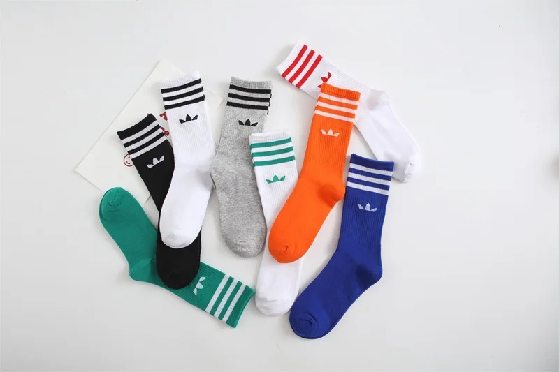 New fashion executive sports socks advertising clover men's and women's cotton socks 2023Ins tide socks striped socks