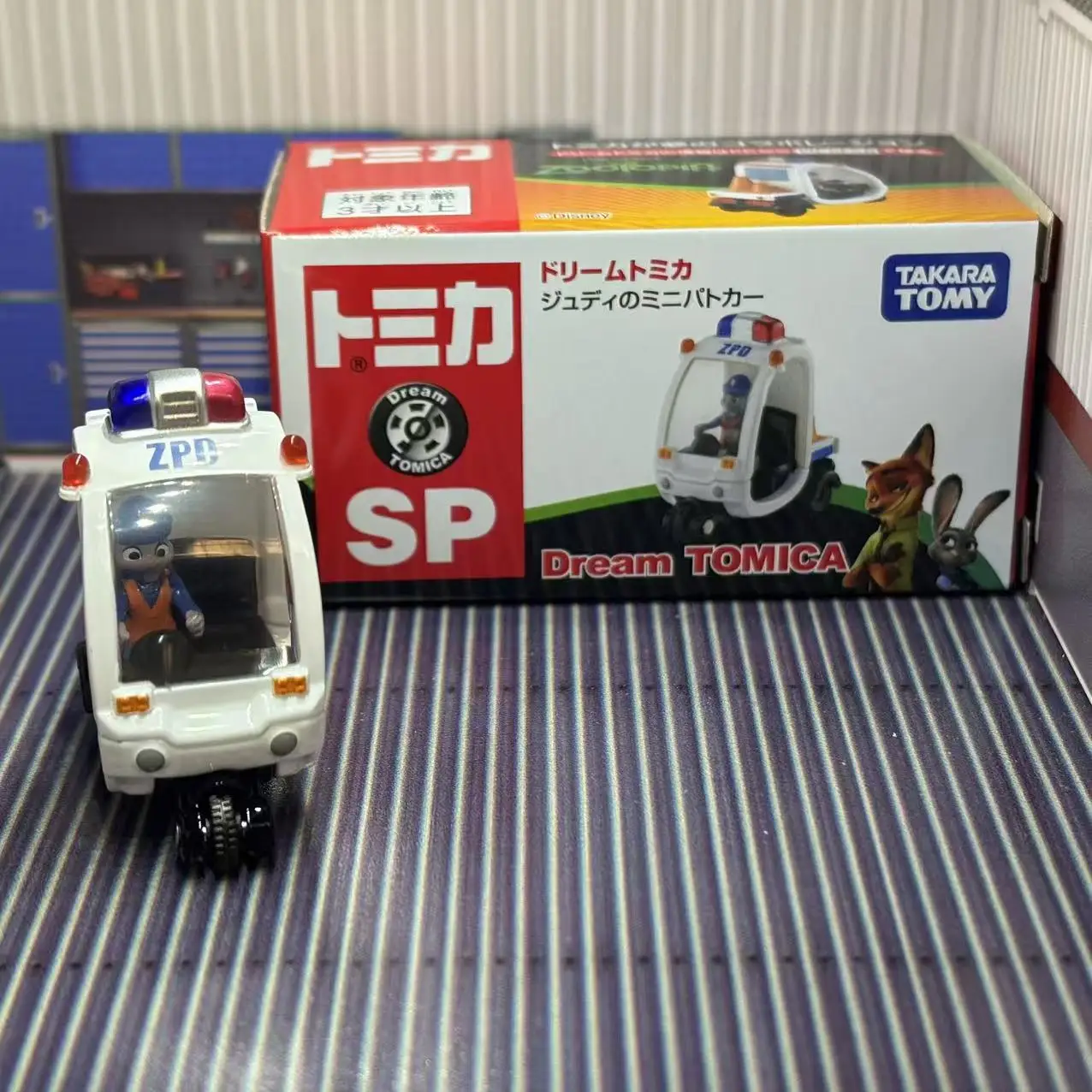 Фото TAKARA TOMY Zootopia 2, игрушечный автомобиль из сплава, Goody Carry, имитация игрового автомобиля, тема Диснея, модель без дистанционного управления, игрушка №3