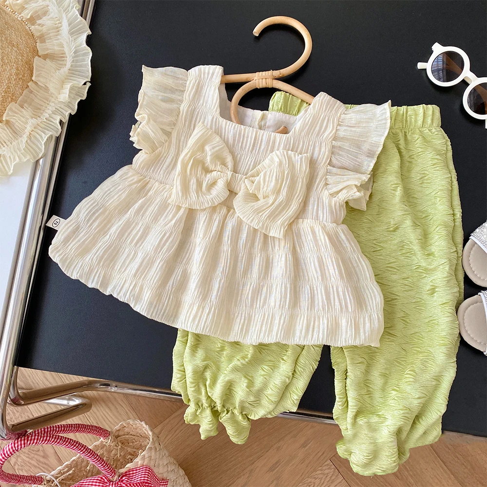 

Korea Summer Girl Clothes Set Solid T-shirt Flower Bud Pants Suit Bow Flying Sleeve Kids Outfits 2pc Pleated Baby Girl Clothes