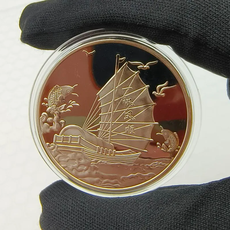 

Позолоченная памятная монета