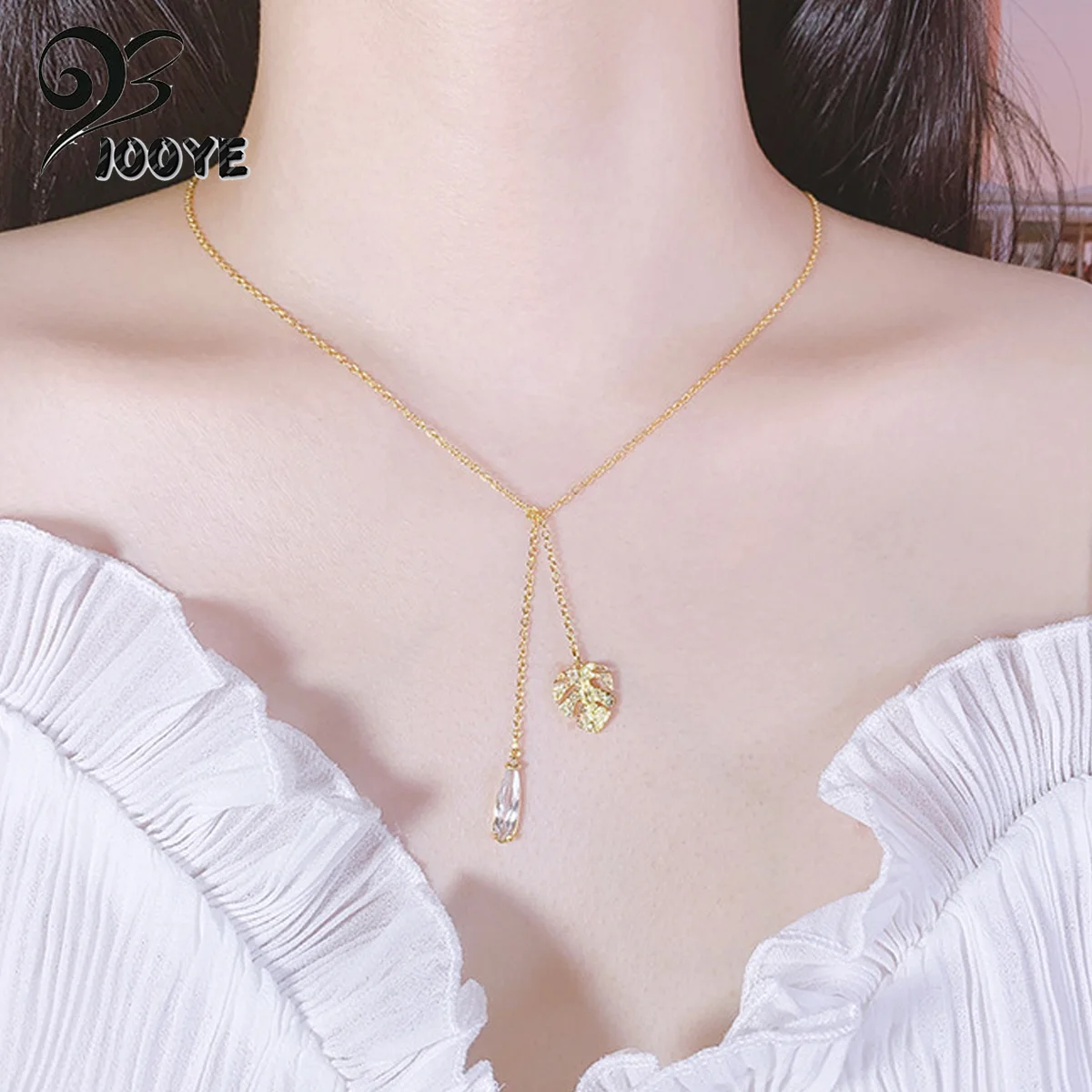 Комплект из колье серёг и браслета с подвеской в виде листьев