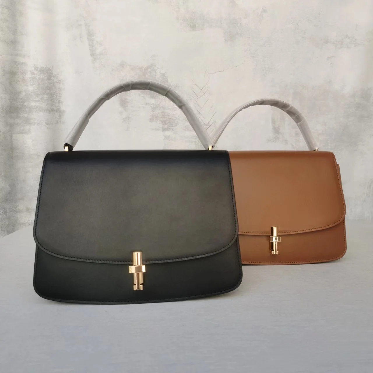 

2023 new The niche design retro classic Joker handbag row cowhide fashion flip handbag leather Korean temperament