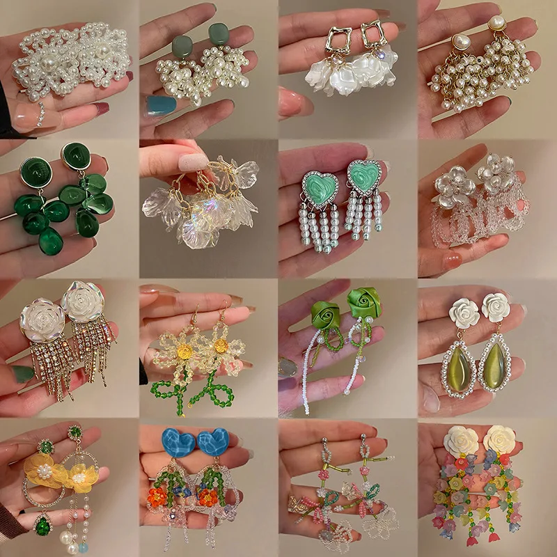 

Женские серьги с жемчугом и кисточками