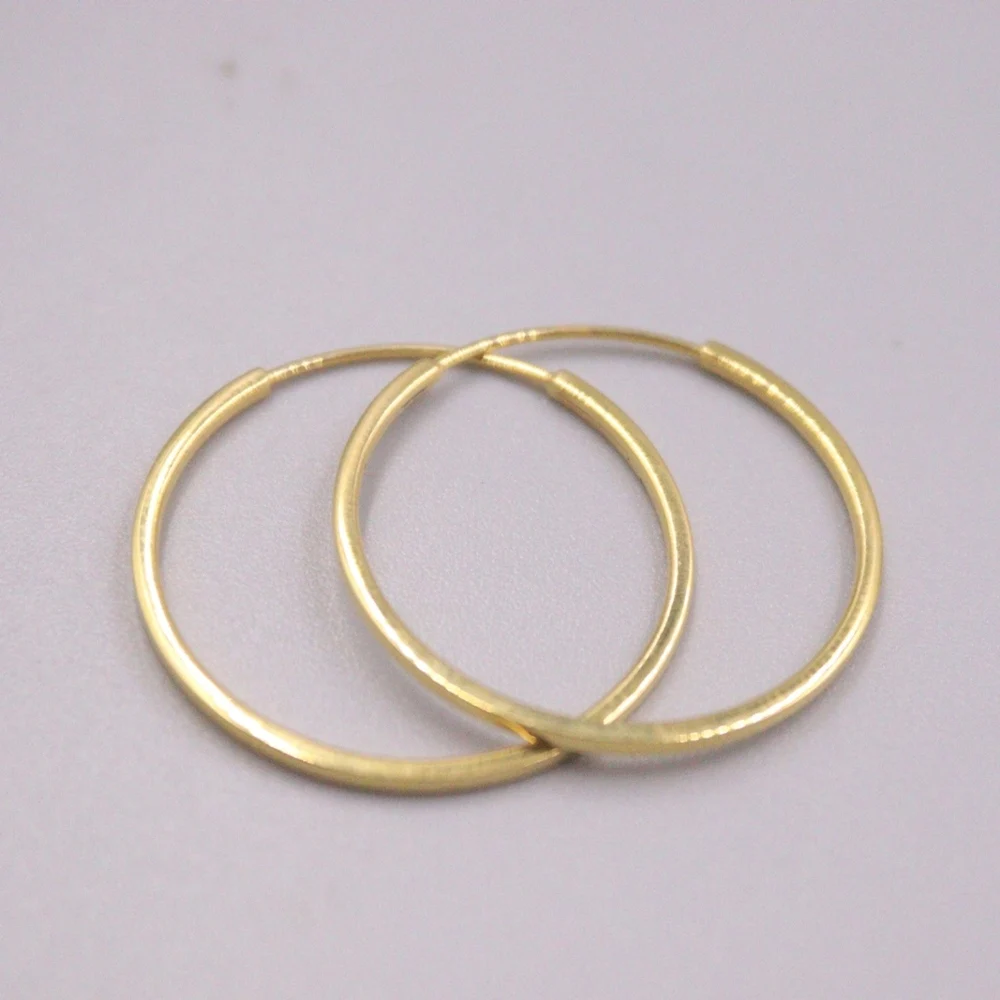 

Серьги-кольца из желтого золота 18 карат, глянцевые, 1,3 г