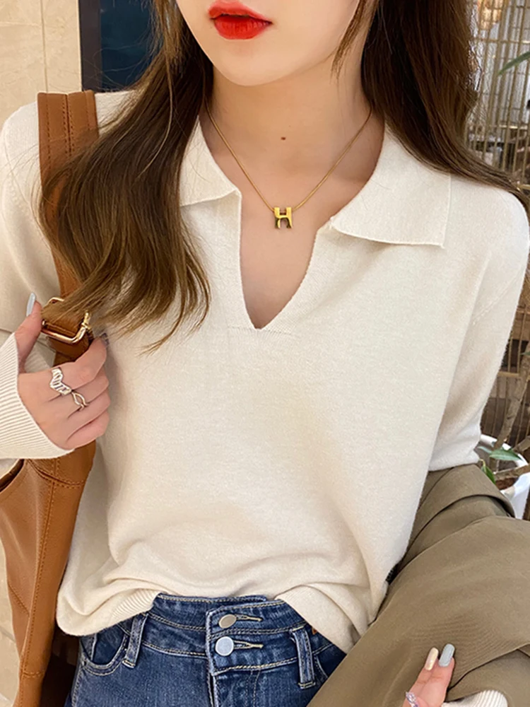 Женский пуловер с воротником-стойкой