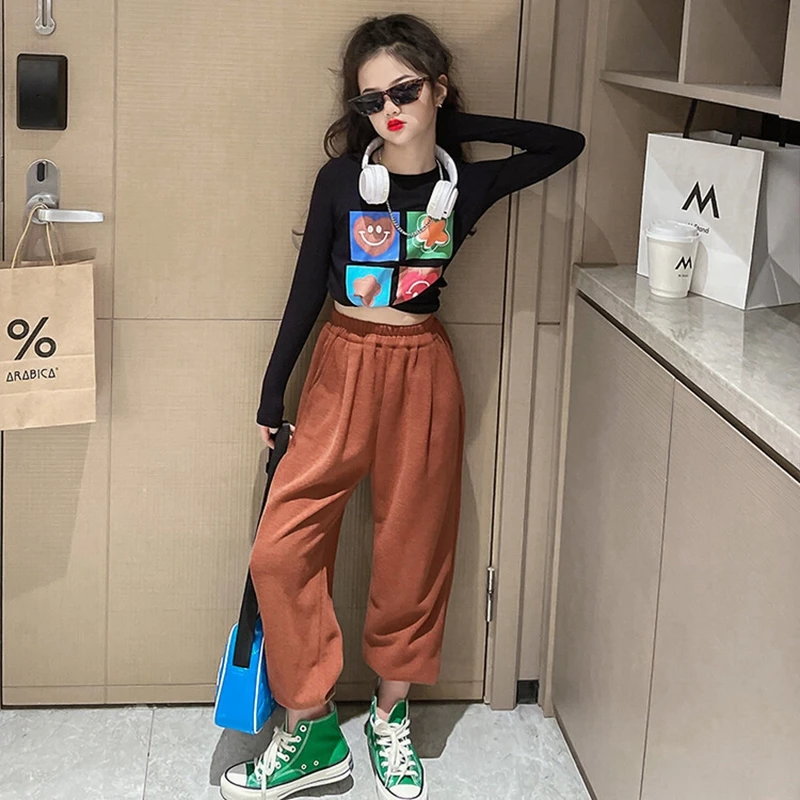 

Костюм спортивный детский из топа и брюк, на возраст 8-14 лет