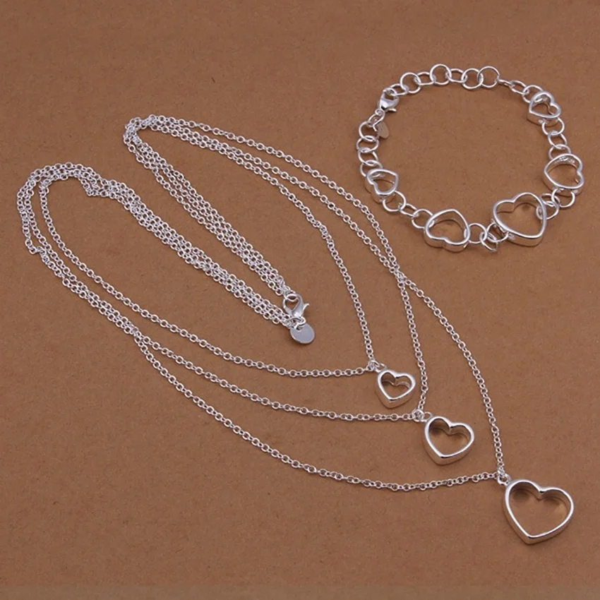 

Factory outlets European style hollow heart pendant necklace bracelets fashion women Silver color jewelry sets