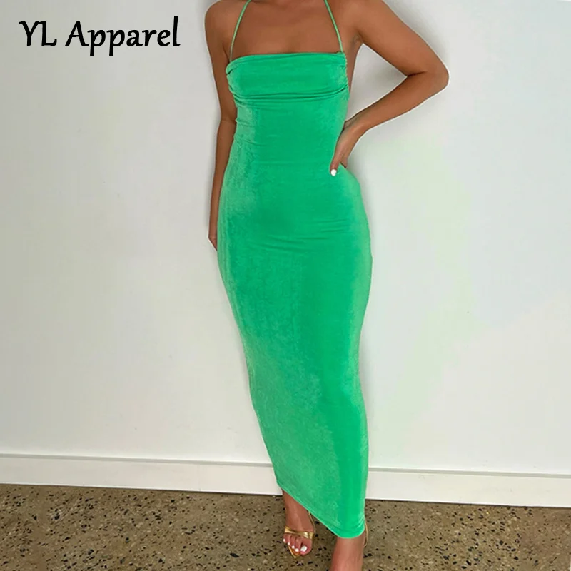 

Женская длинная туника с высокой талией и лямкой на шее