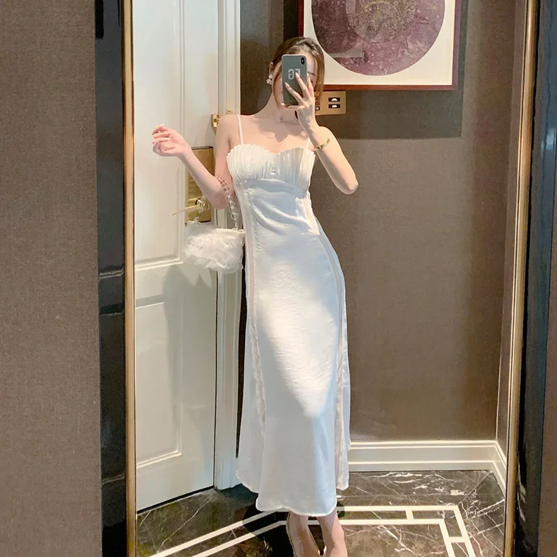 

Women Summer Sexy Spaghetti Strap White Fairy Dress French Soild Dress 2021 female New Sleevess High Waist A-Line Long Dress
