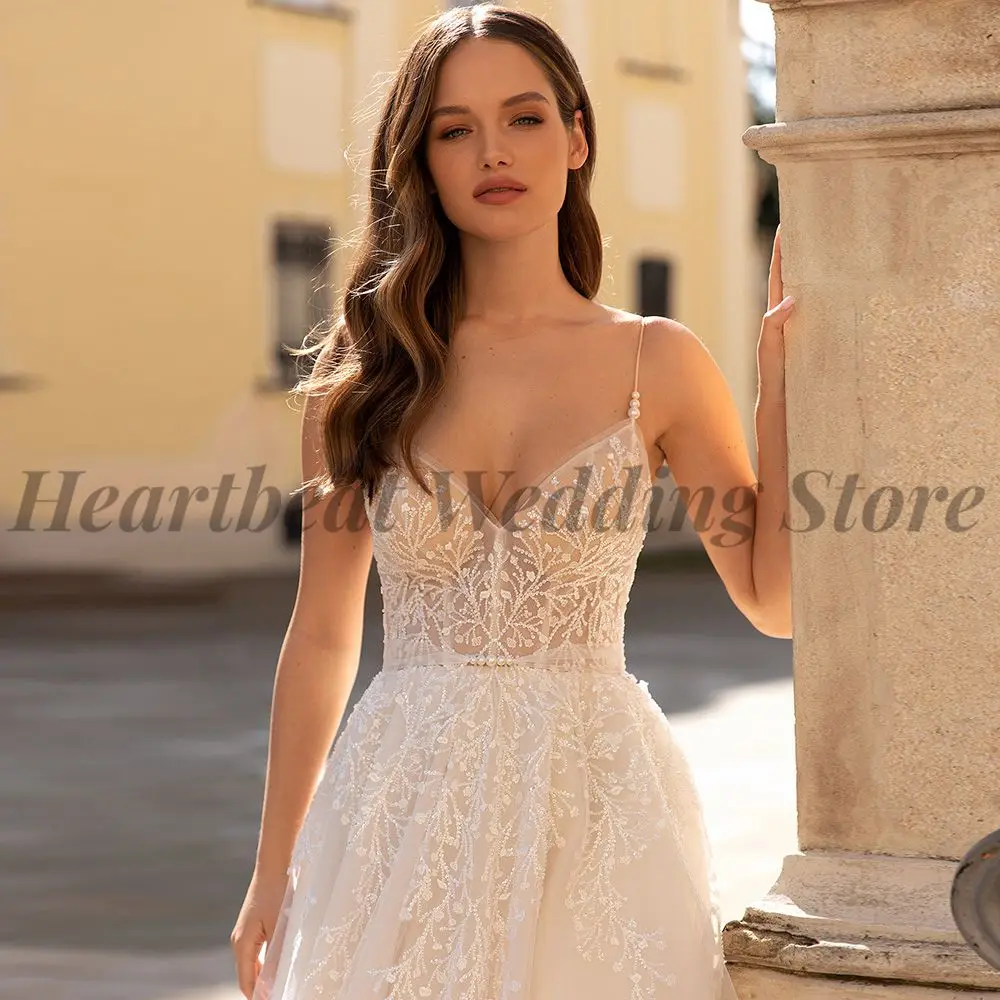 

Spaghetti Straps Wedding Dress 2023 Exquisite with V-Neck Backless Applique Sequin Beads Pearls Court Train A-Line for Ladies