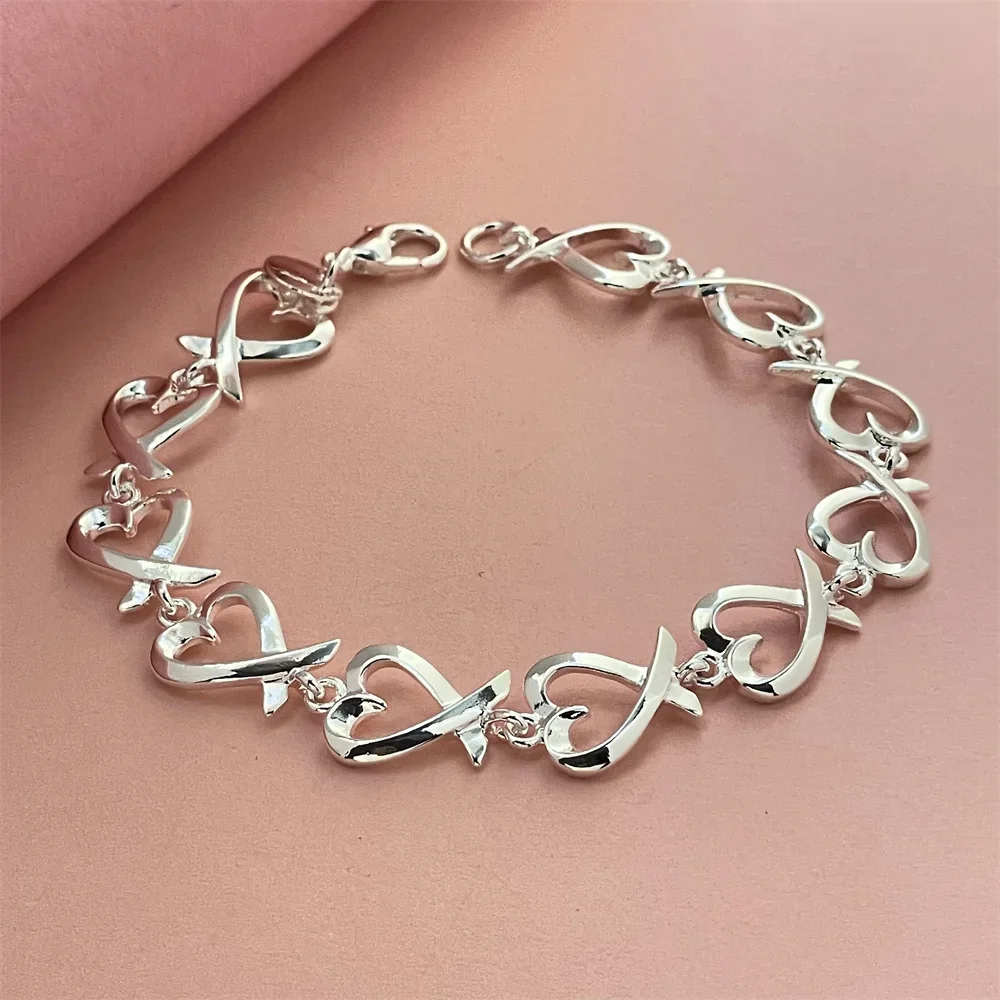 Женский браслет из серебра 925 пробы со звездами