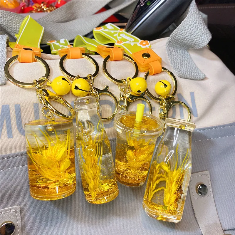 

Creative Wheat Ear Liquid Quicksand Bottle Design Barley Keychain Men and Women Exquisite Yellow Wheat Pendant Couple Pendant