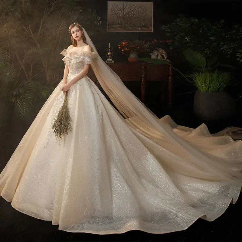 

Starry Sky Master Wedding Dress Big Tail 2022 New Temperament Bride One Word Shoulder Super Fairy Dream French