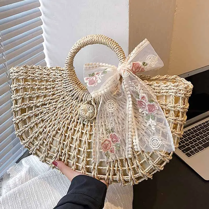 

Hollow Straw Woven Lace Bow Woman Daily Small Round Handbag 2022 New Fashion Luxury Designer Reusable Shoulder Portable Lined