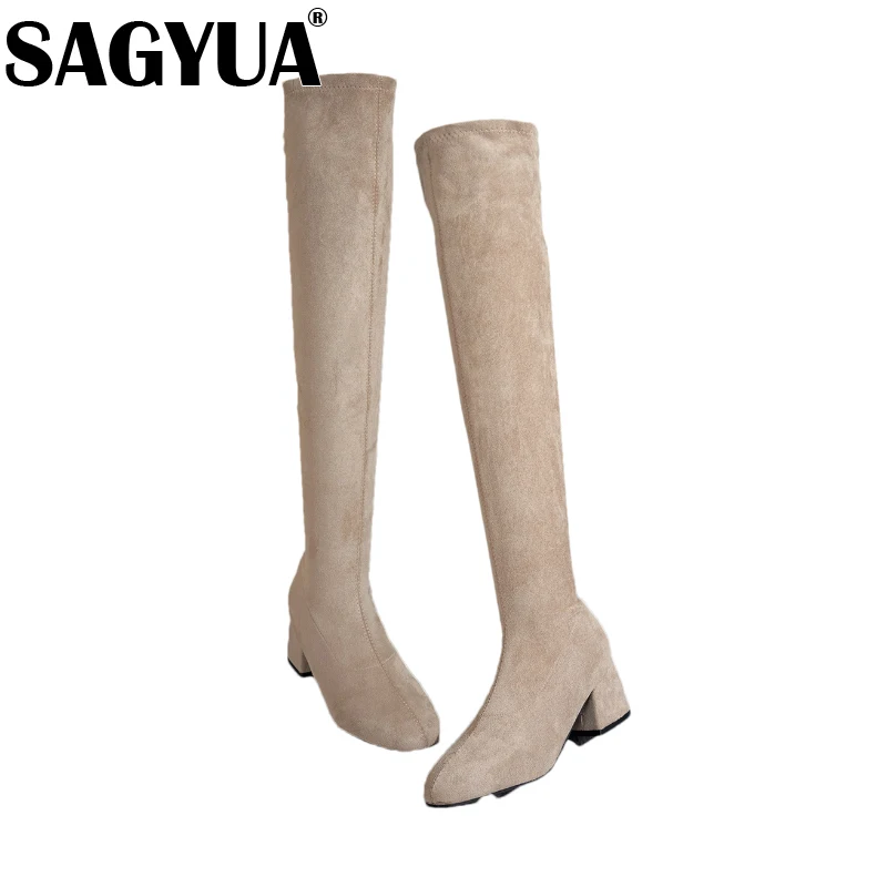 Женские сапоги выше колена на высоком каблуке. Замшевые туфли массивном