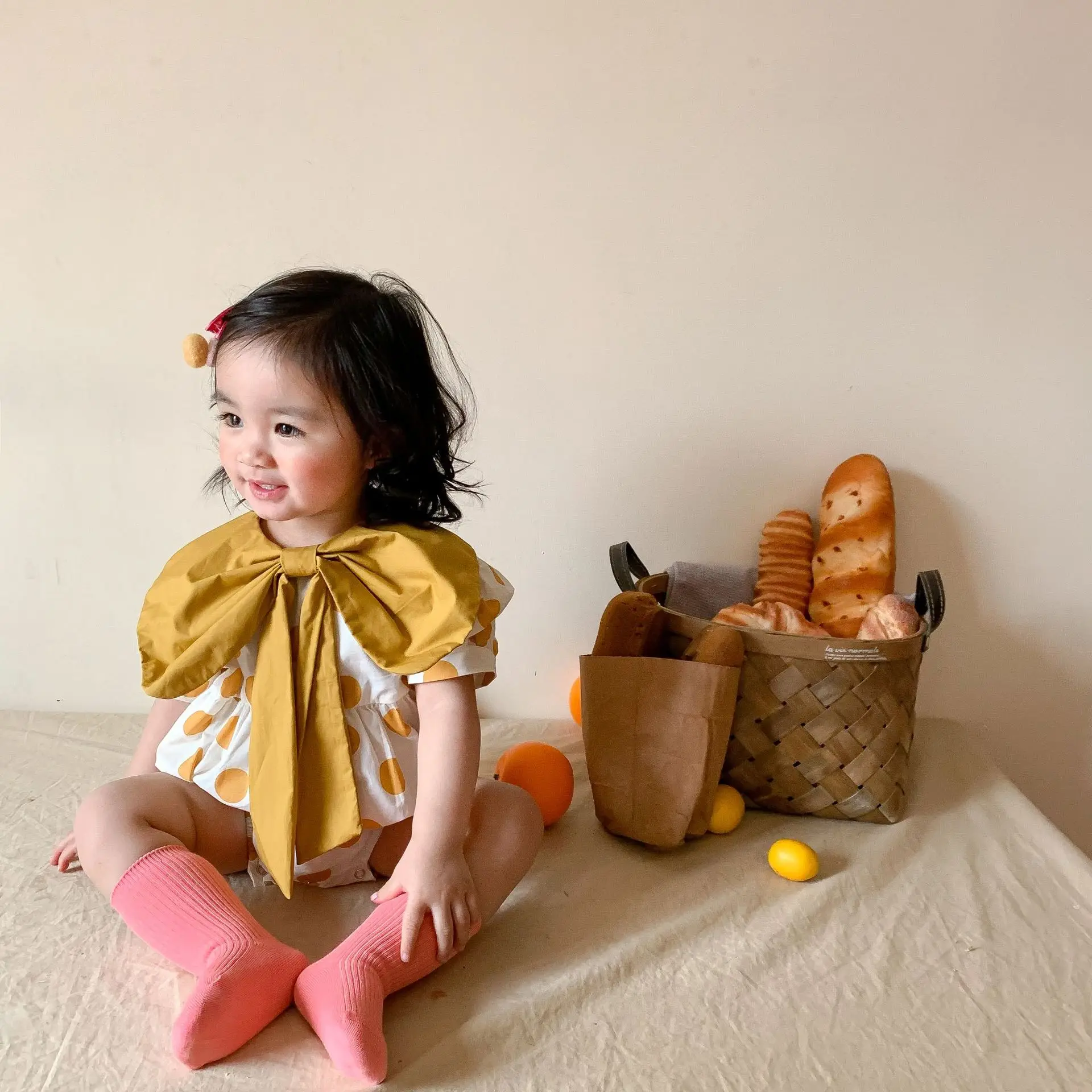 

Baby girl jumpsuit 2022 summer baby girl baby girl wave point big bow on the chest bag fart romper