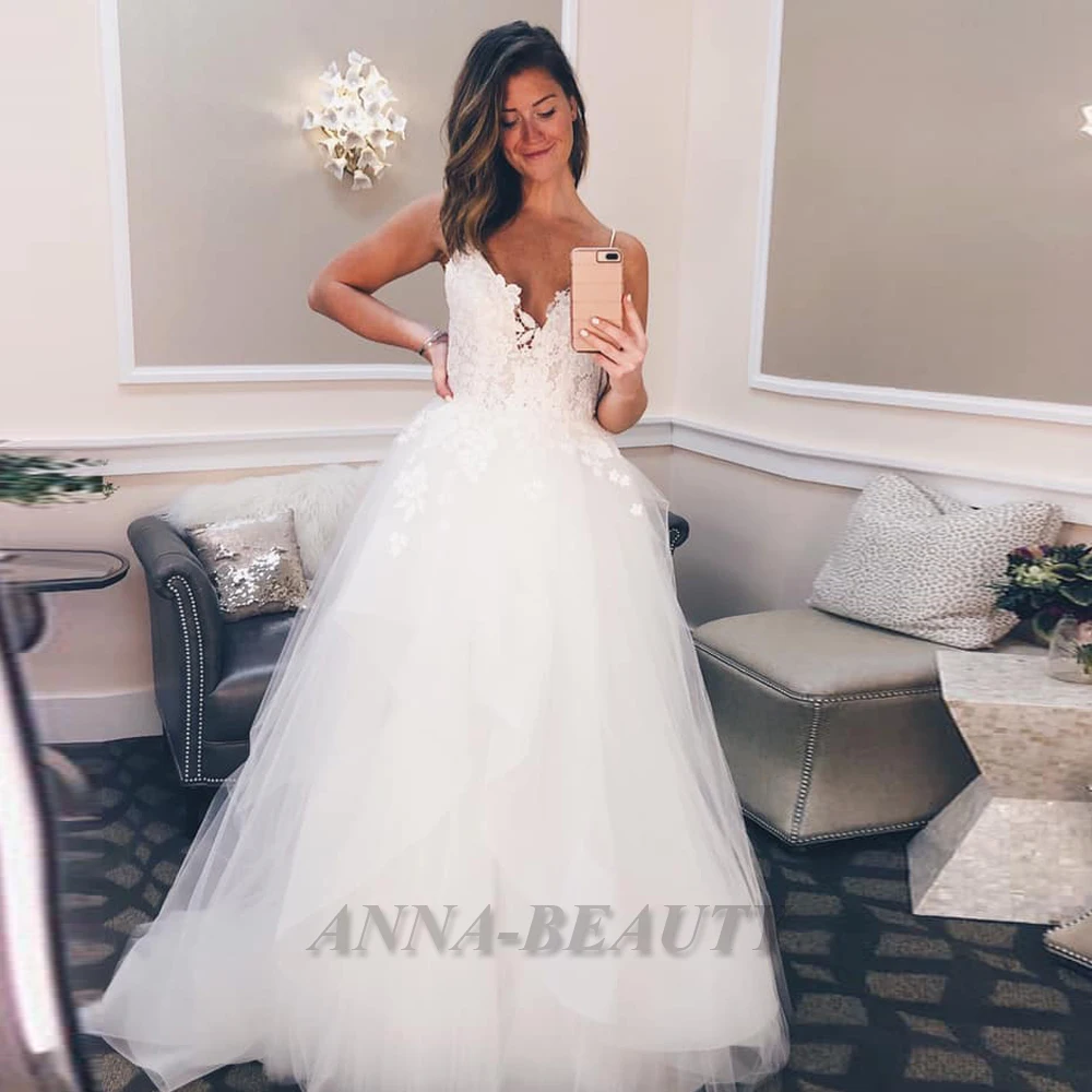 

Anna Simple A Line Wedding Dresses Spaghetti Strap Appliques Tulle Court Train Lacing Up Sleeveless Robe De Mariée Personalised
