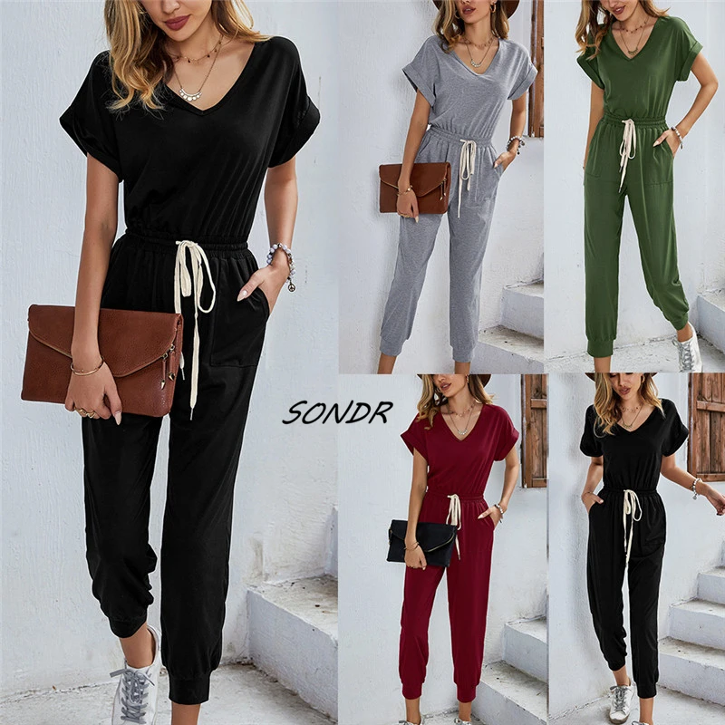 

Женский трикотажный комбинезон с V-образным вырезом и карманами