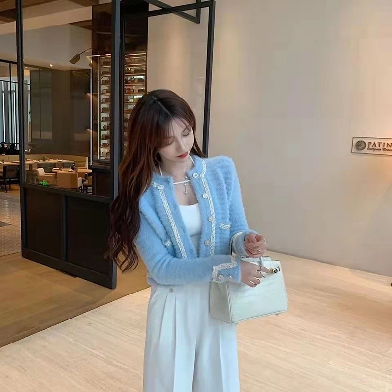 Женский трикотажный жилет с открытыми плечами и бантом |