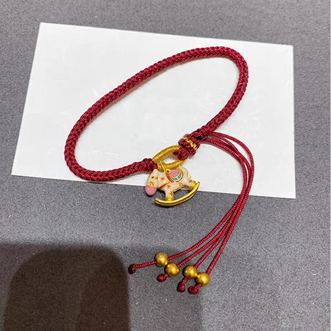 Браслет Sennier из хлопка с кулоном