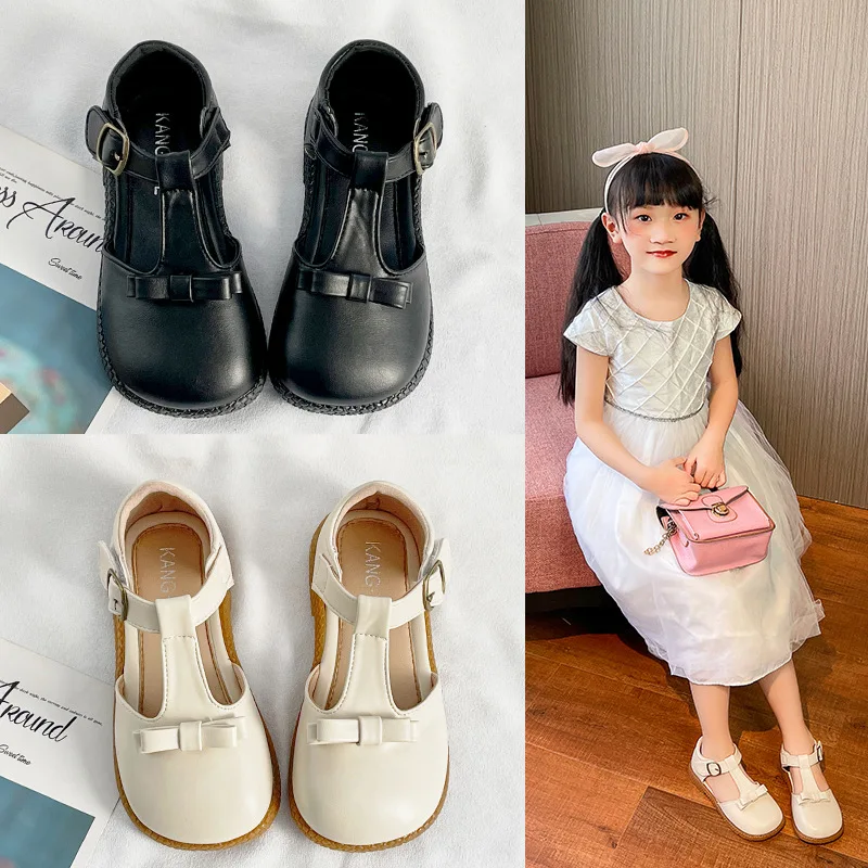 

Летние сандалии для девочек, модная детская обувь на плоской подошве, с Т-образным ремешком и бантом, Детские милые полубосоножки принцессы,...