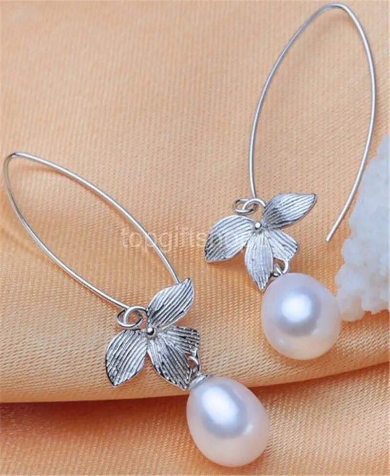 

Natural white 9-10mm cultured freshwater Pearl earrings 925 silver
