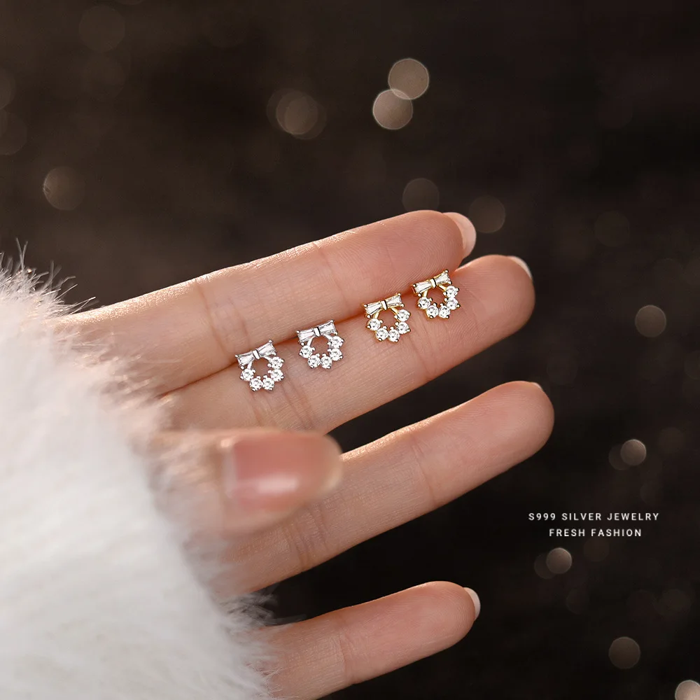 Женские серьги-банты из серебра 999 пробы с цирконом