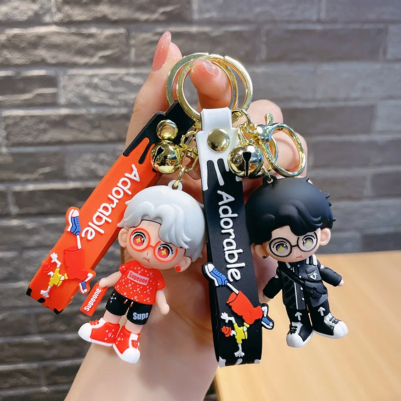 

Оригинальный креативный модный крутой мужской брелок для ключей с куклой автомобильный брелок с подвеской в виде пары сумок Модный милый п...