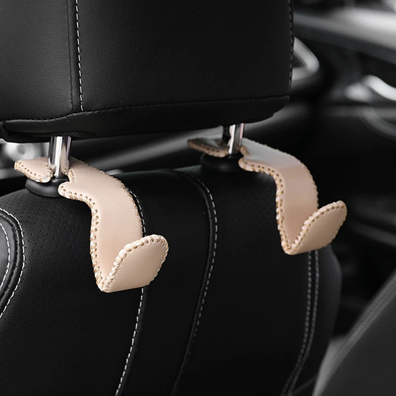 

Крючки на подголовник автомобильного сиденья, скрытая Вешалка из искусственной кожи для спины, держатель для хранения, органайзер, задняя стойка для кошельков, сумок, аксессуары для интерьера