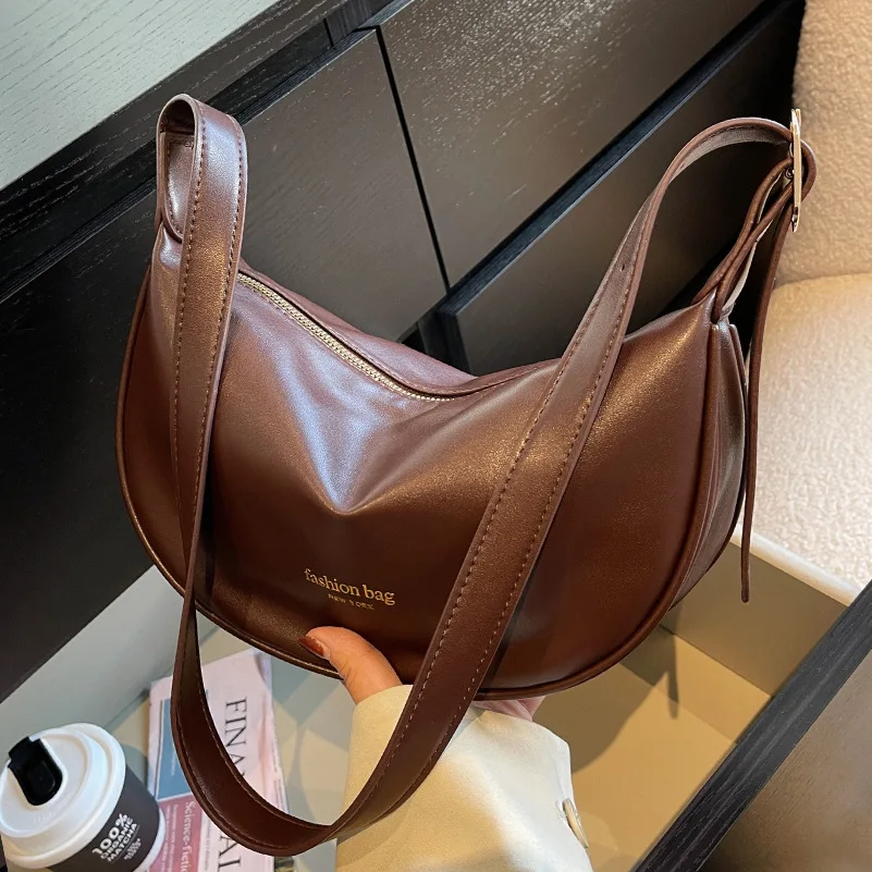 

Вместительные сумки Хобо для женщин, однотонная Высококачественная Женская модная дизайнерская универсальная сумка через плечо для пельм...