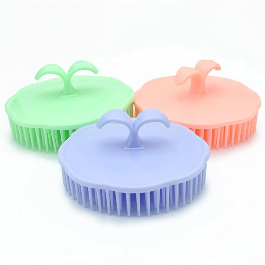 

Силиконовая щетка для мытья волос