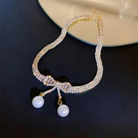 fashion rhinestone shiny bow pearl necklace 2022 new ladies temperament high end summer niche design sense collar bone chain