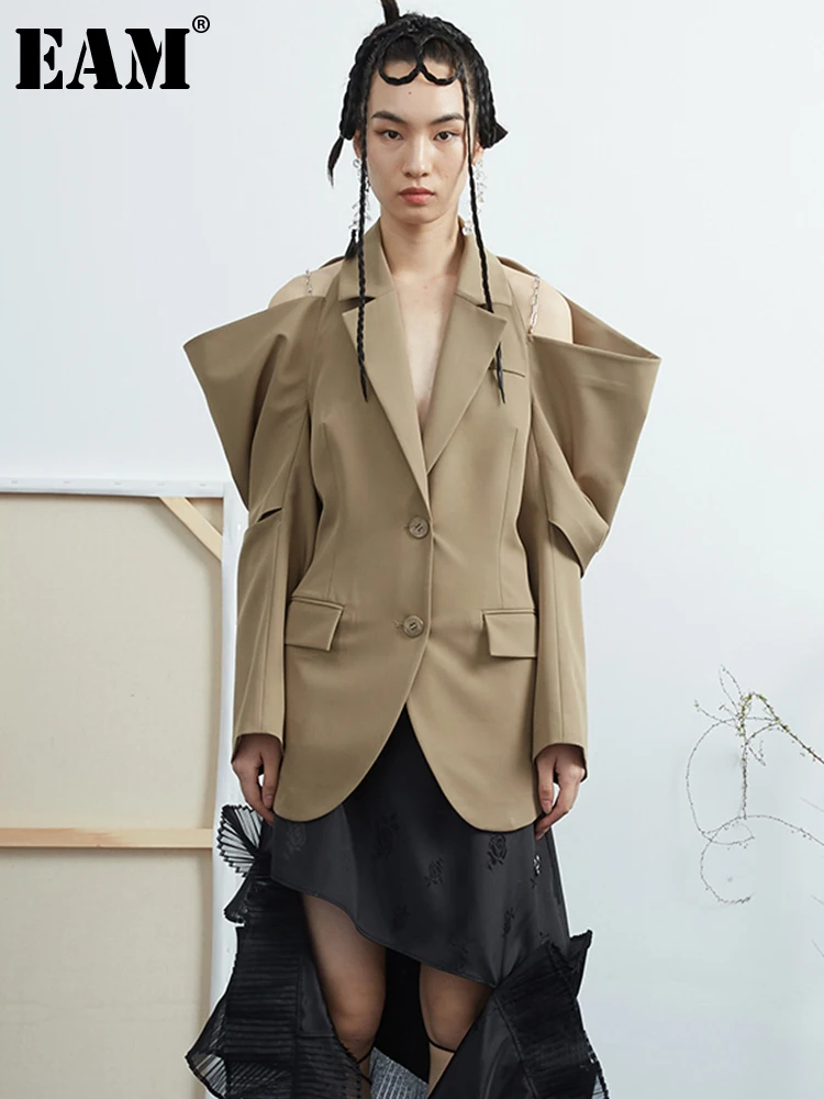 

[EAM] Women Khaki Hollow Out Off Shoulder Blazer New Lapel Long Sleeve Loose Fit Jacket Fashion Tide Spring Autumn 2023 1DD7058