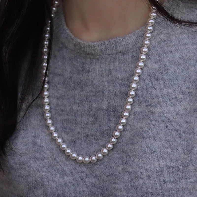 s925Серебряный круг Shijia Pearl Yuanbao Knot60cmОдлиненное ожерелье Женское модное