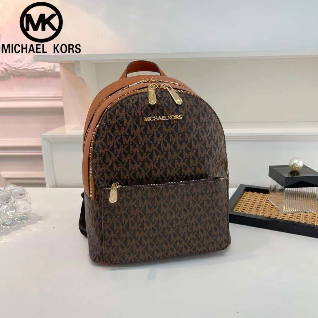 Фото Michael Kors Sheila Series 2026 Новый модный городской женский повседневный дорожный рюкзак большой вместимости, простой, из водонепроницаемого ПВХ-материала №1